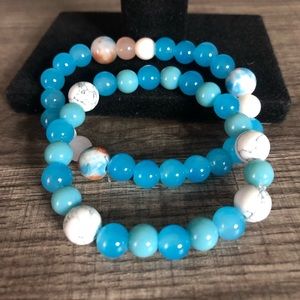 Blue, pink , and multicolored bracelets